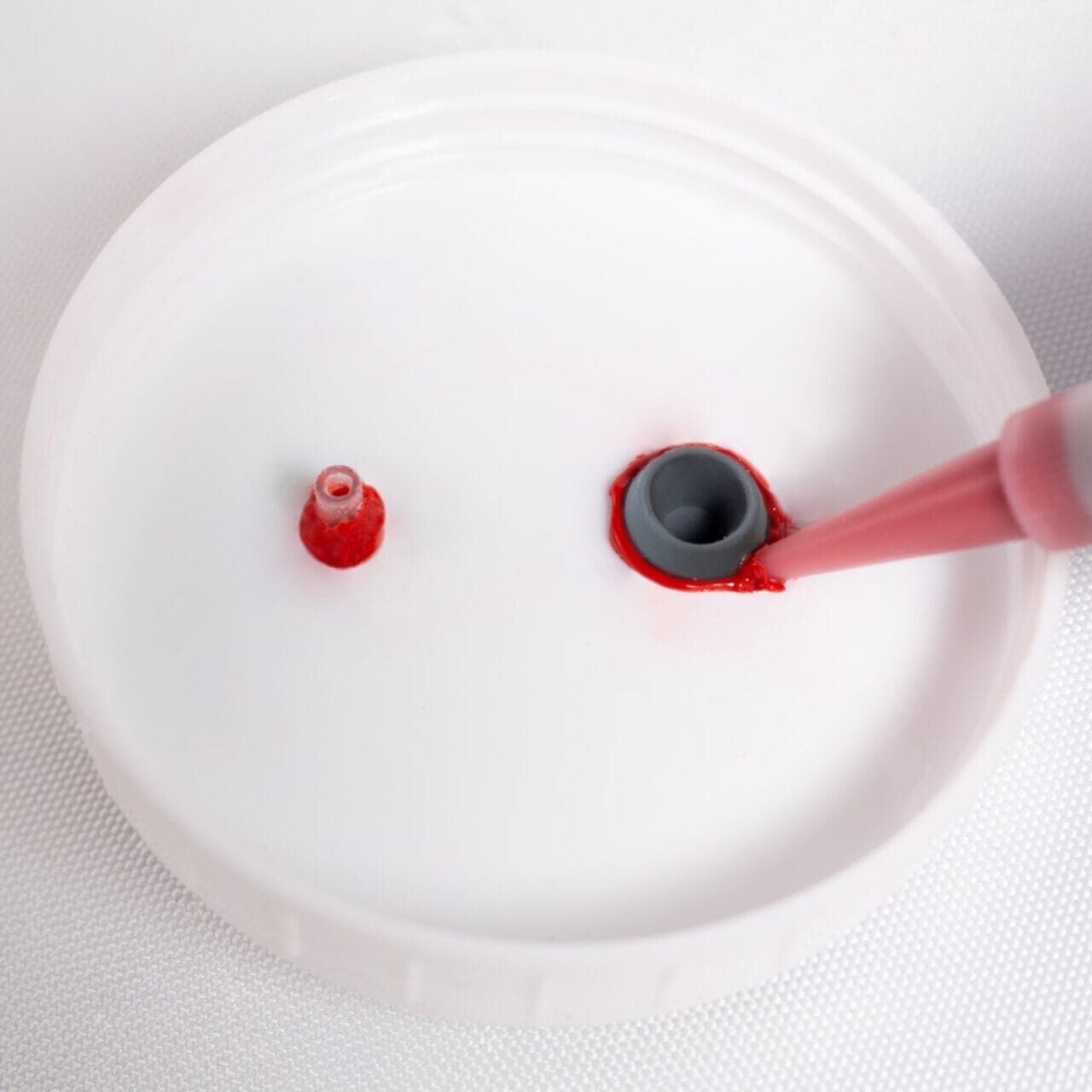 Red RTV on inside of cap